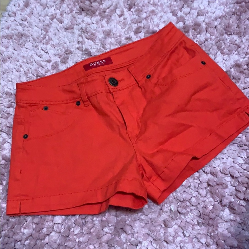 Tangerine guess shorts.